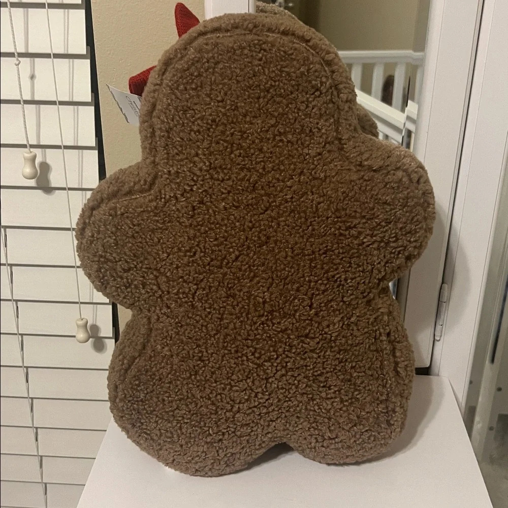 Brown Gingerbread Man Plush with Red Accents pillow
